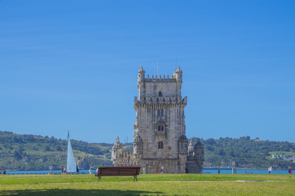 Belem Tower standing at the edge of the Tagus river in Lisbon
