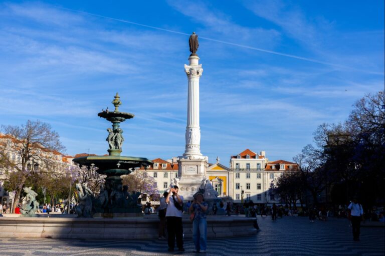 Rossio Square in Lisbon with its baroque fountain and central column
