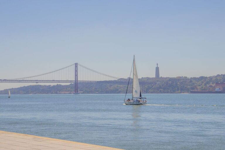 Sailboat on the Tagus with the 25 de Abril Bridge