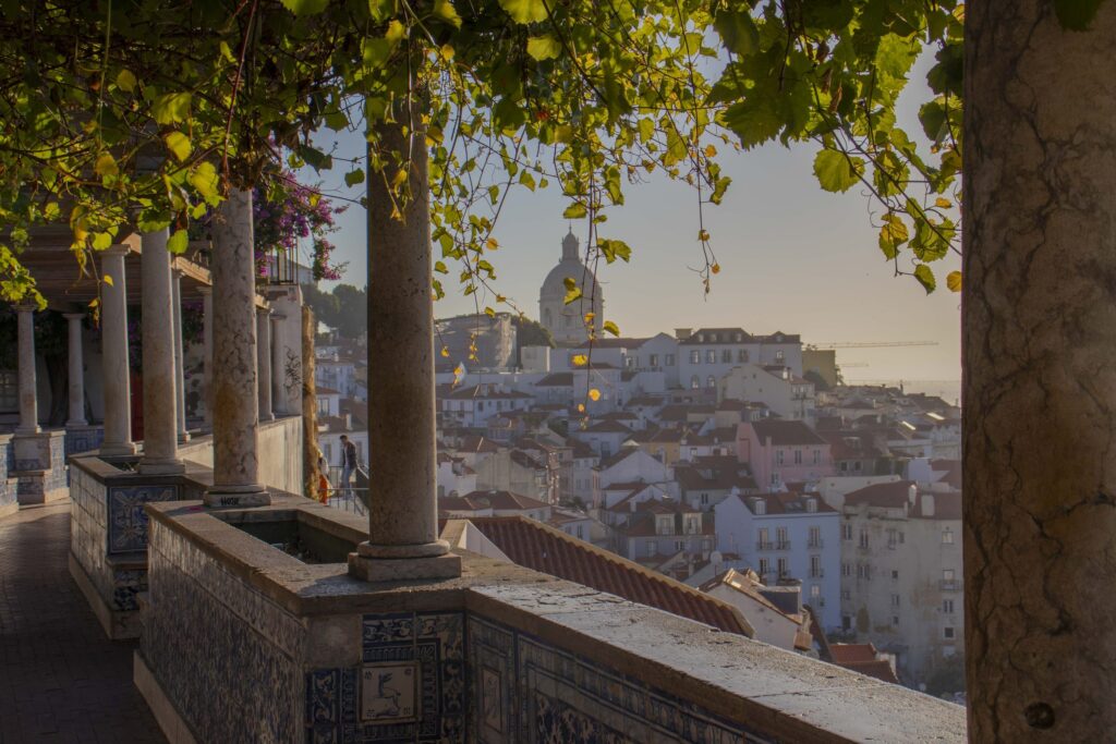 Sunrise under the pergola at Miradouro de Santa Luzia, Lisbon