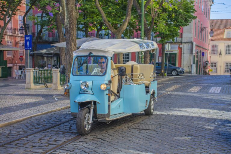 Tuk-tuk on a cobbled square in Chiado